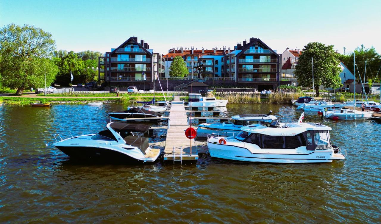 Marina Ostróda III - widok na jezioro, podziemny garaż, winda, klimatyzacja, wanna i prysznic, 2 łazienki, lux - B&B Ostróda