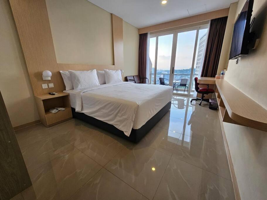 Apartment Nagoya Thamrin City - Dream Homestay - Bed and Breakfast