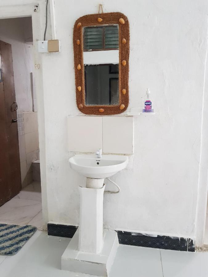 Camera Familiare con Bagno in Comune