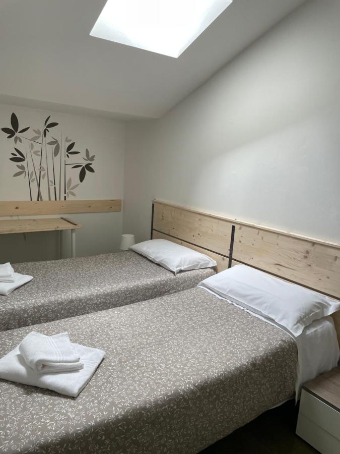 Tweepersoonskamer met 1 of 2 Bedden en Gedeelde Badkamer