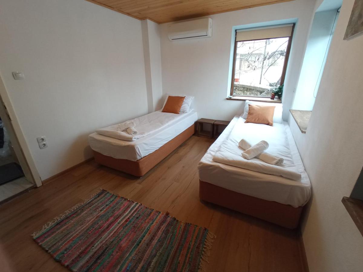 Tweepersoonskamer met 1 of 2 Bedden en Gedeelde Badkamer
