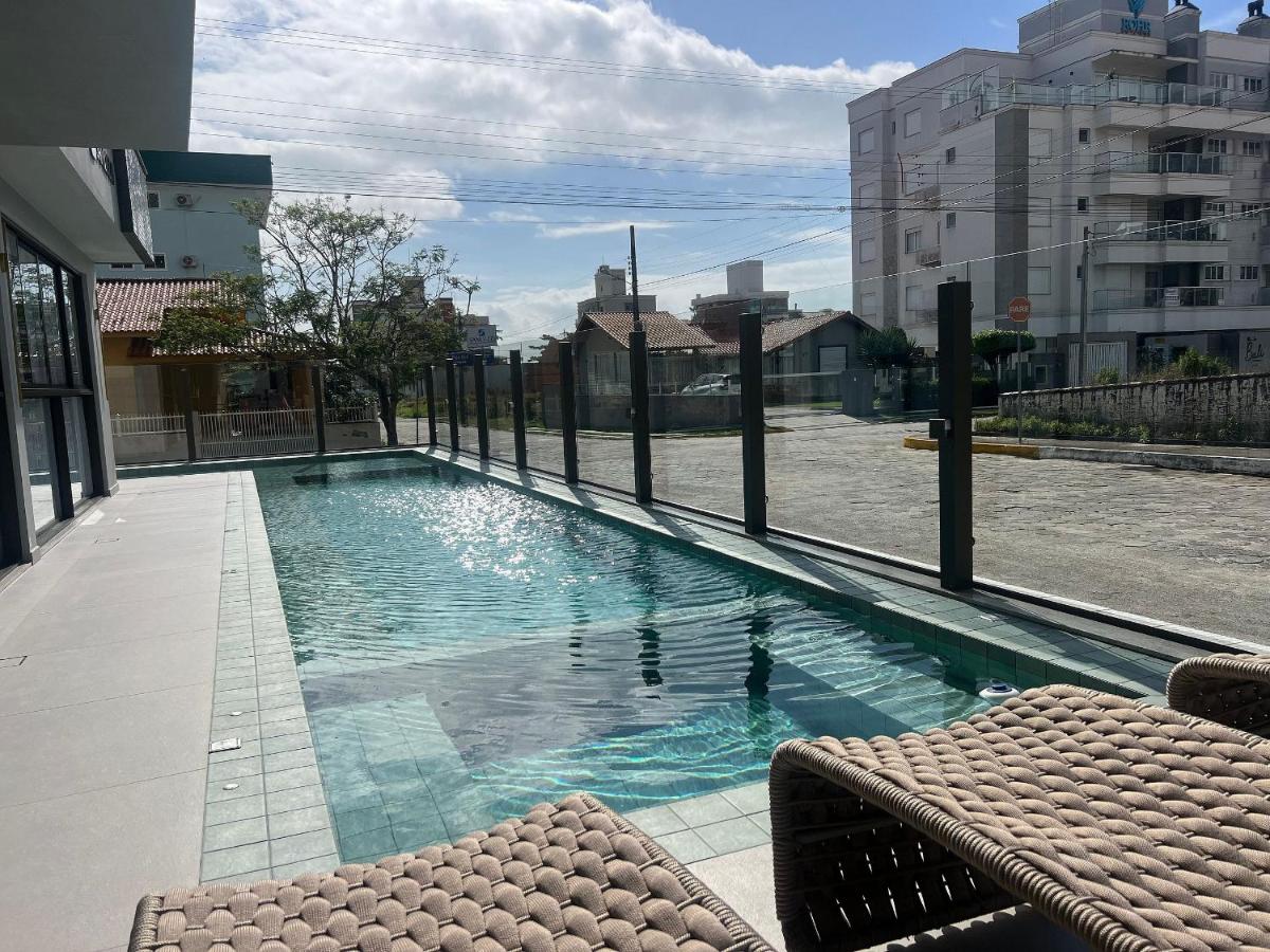 Piscina no condominio! Apto na praia de Palmas! OJ04I - B&B