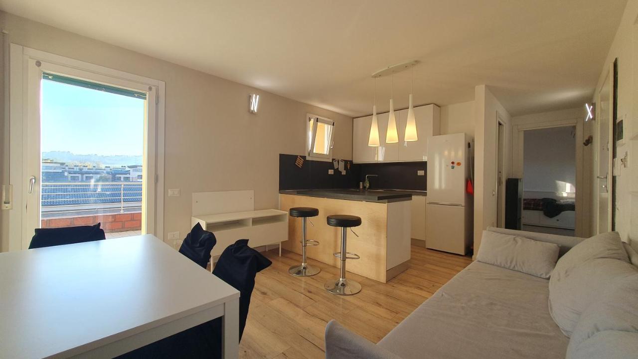 Ultimo piano con terrazzo e posto auto - B&B