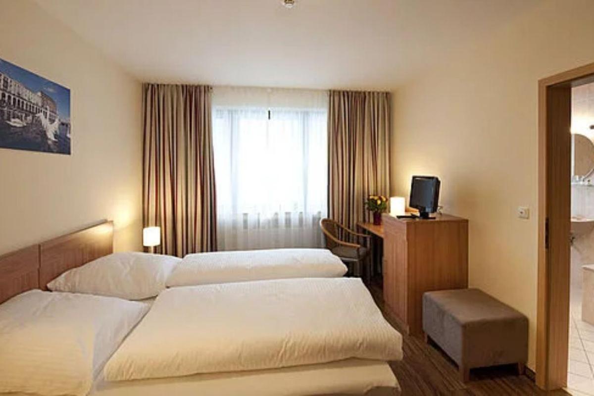 OIL! INN Pension - Ferienwohnung