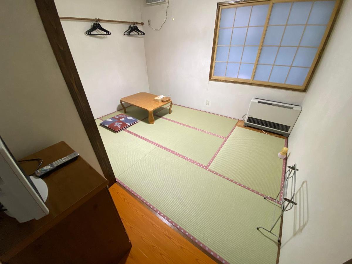 Chambre Triple avec Salle de Bains Commune