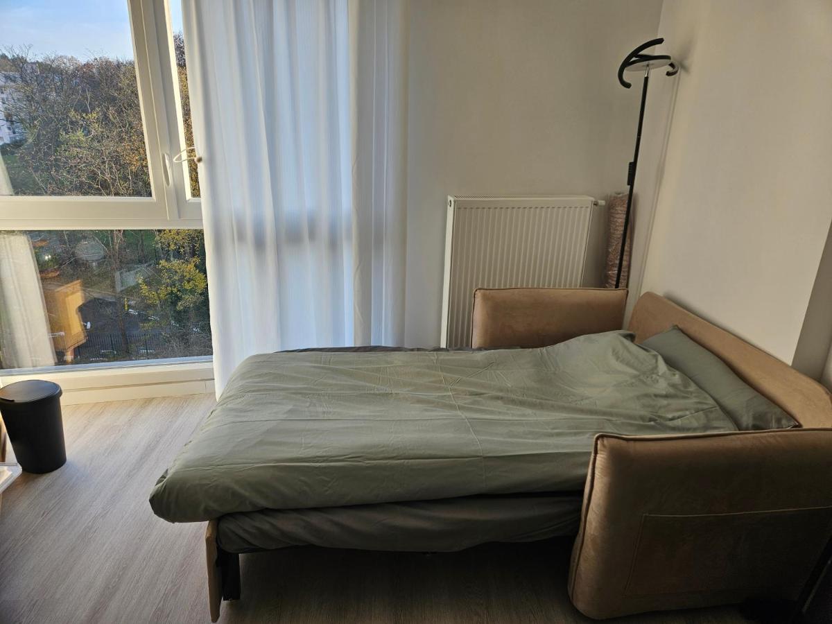 Lit simple -canapé lit dans appt partagé - Ferienwohnung