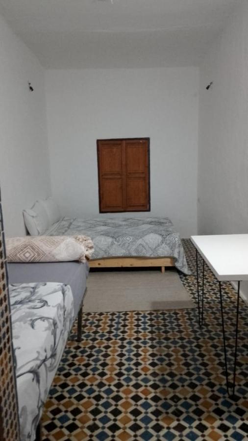 Economy Quadruple Room with Shared Bathroom