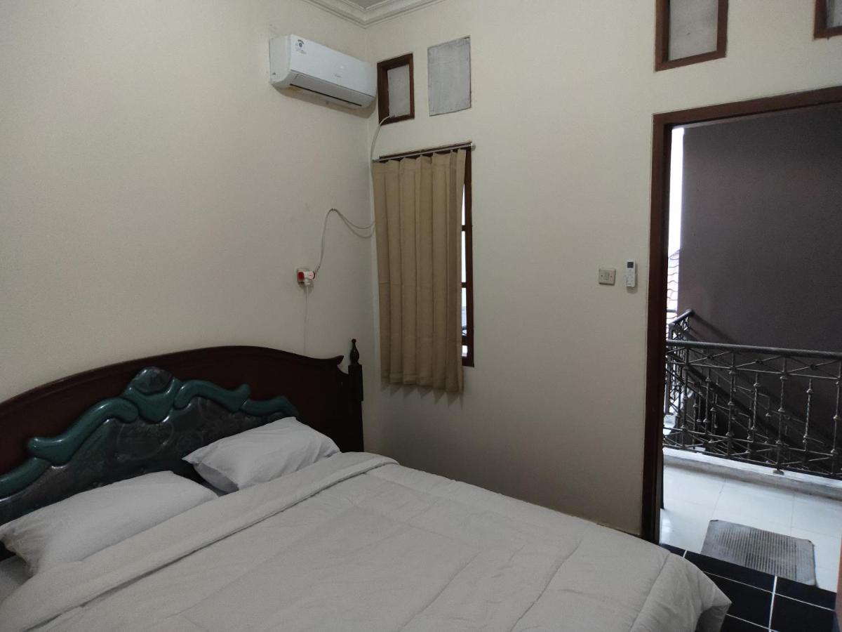 Queen Room with Shared Bathroom