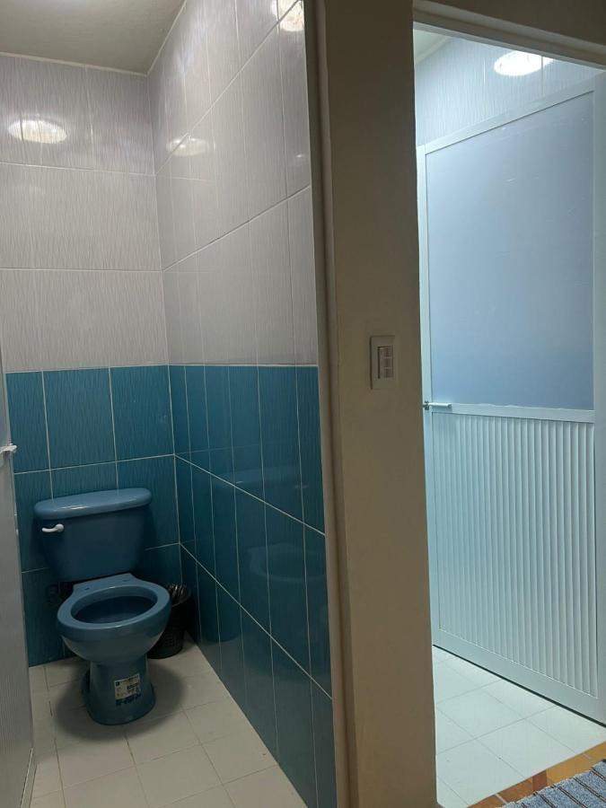 Camera Doppia con Letti Singoli e Bagno in Comune