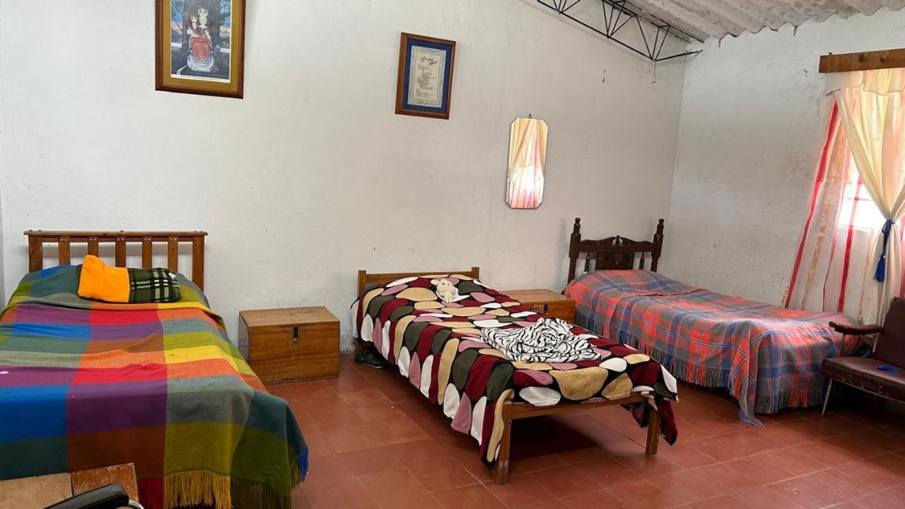Habitación Triple con vistas al jardín