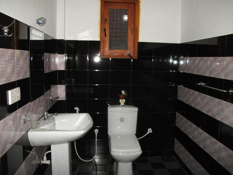 Habitación Doble Deluxe (2 adultos + 1 niño)