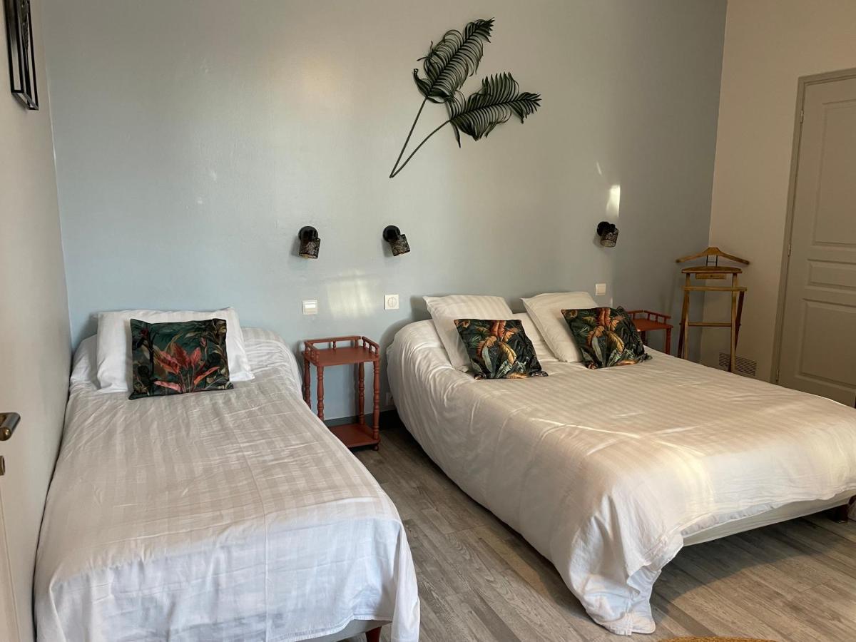 Dreibettzimmer mit Gartenblick