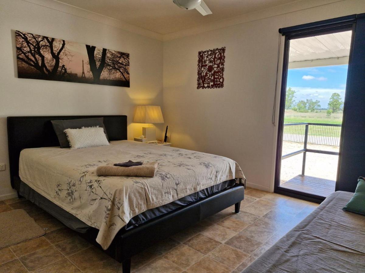 Queen Room with Shared Bathroom