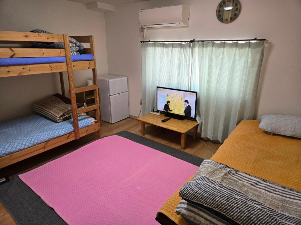 Chambre Familiale avec Salle de Bains Commune