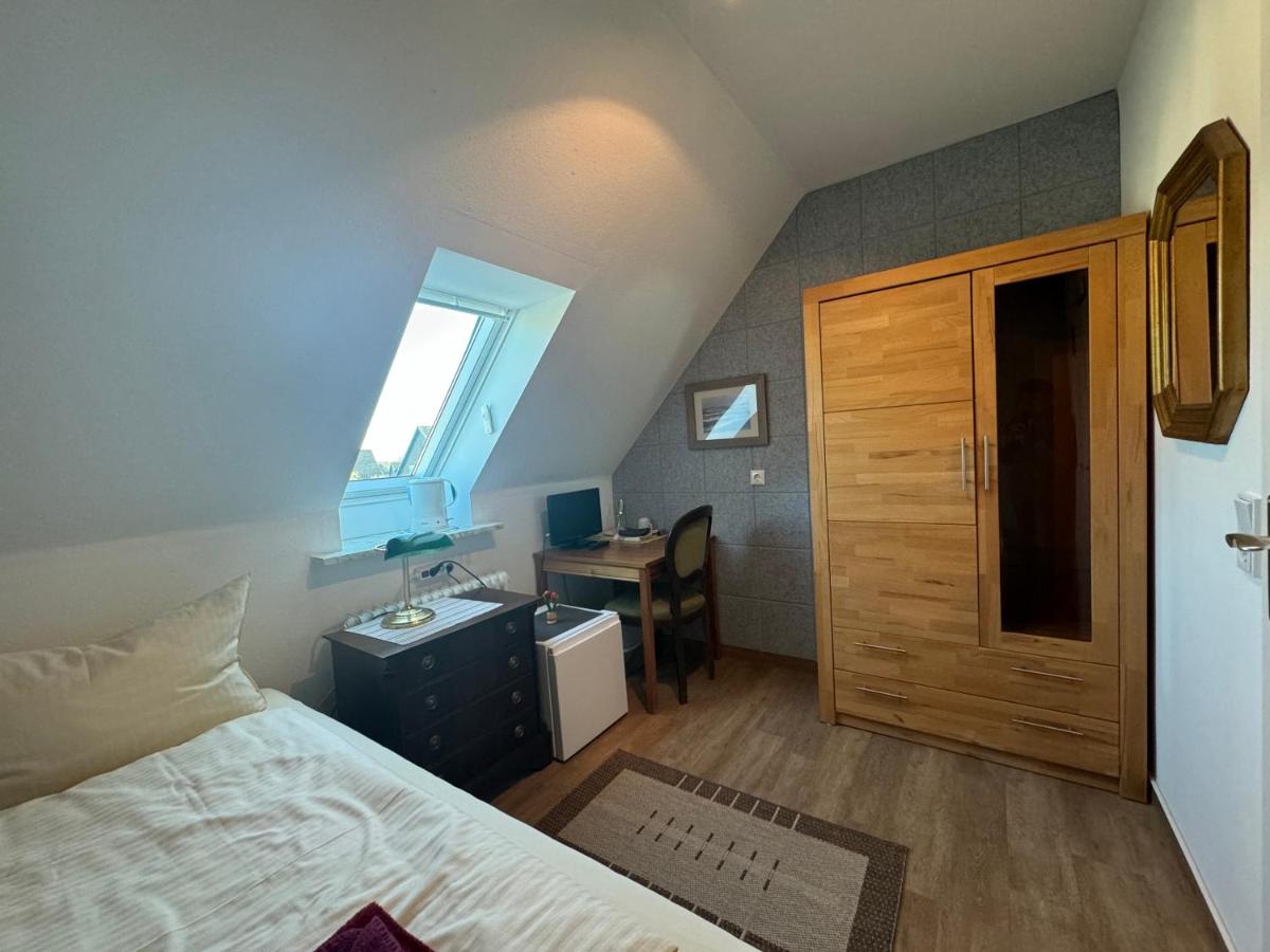 Habitación individual con aseo compartido