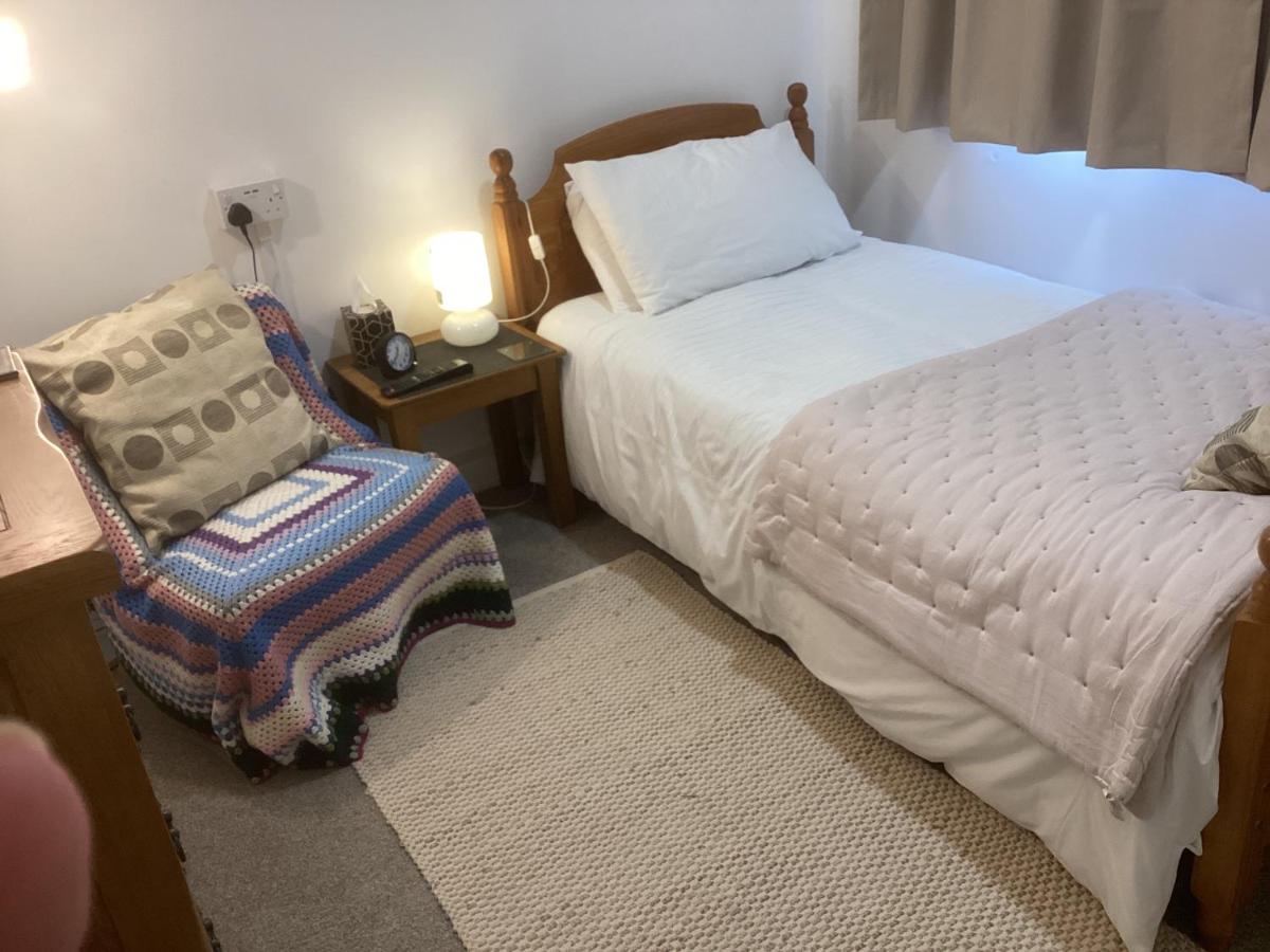 Camera Singola con Bagno in Comune