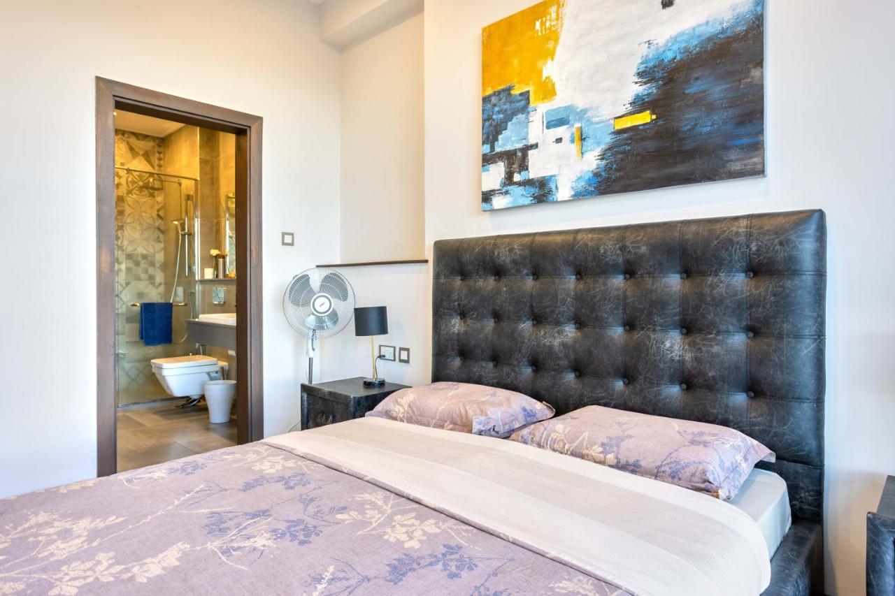 One-Bedroom Apartment with Balcony and City View