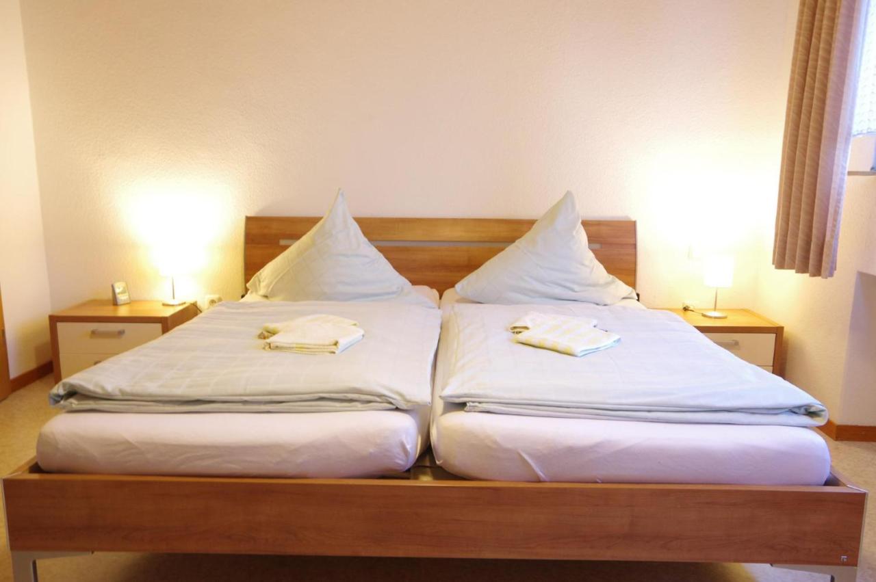 Dreibettzimmer mit Gemeinschaftsbad