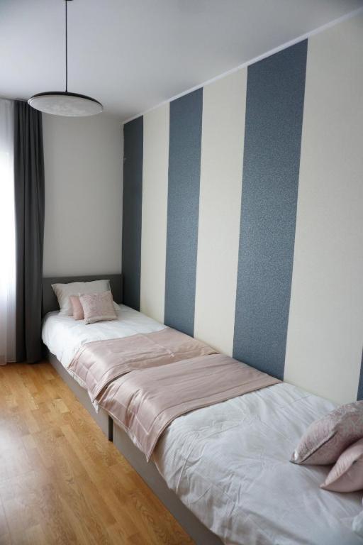 Three-Bedroom Apartment with Water View