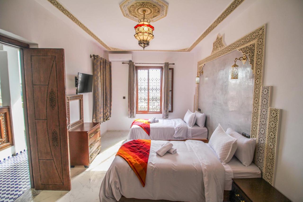 Chambre Triple - Vue sur Ville