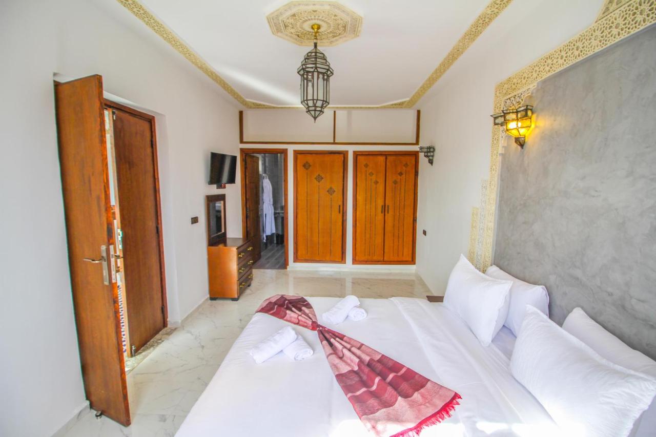Chambre Triple - Vue sur Ville
