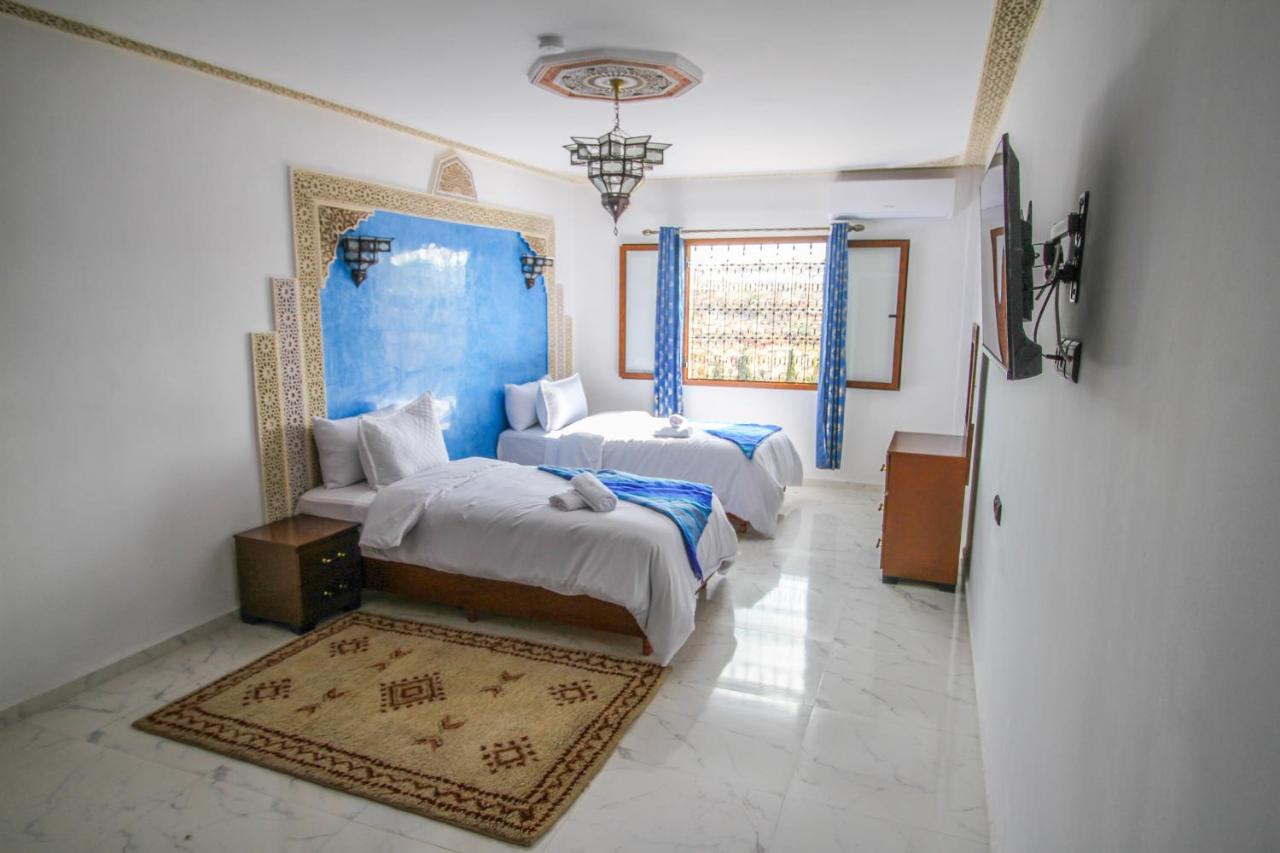 Chambre Triple - Vue sur Ville