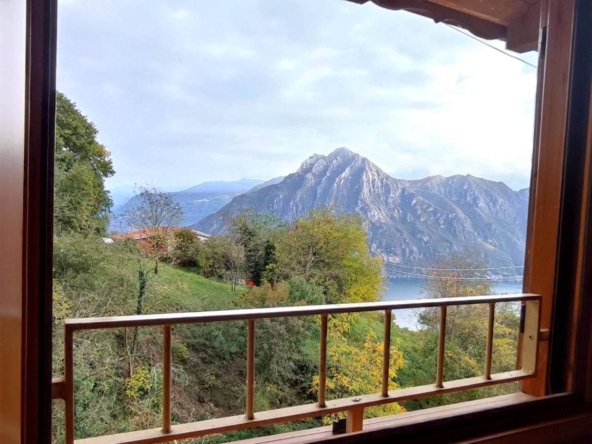 Oasi Azzurra - Cosy flat with a terrace and a great view over lake and mountains - B&B Fonteno