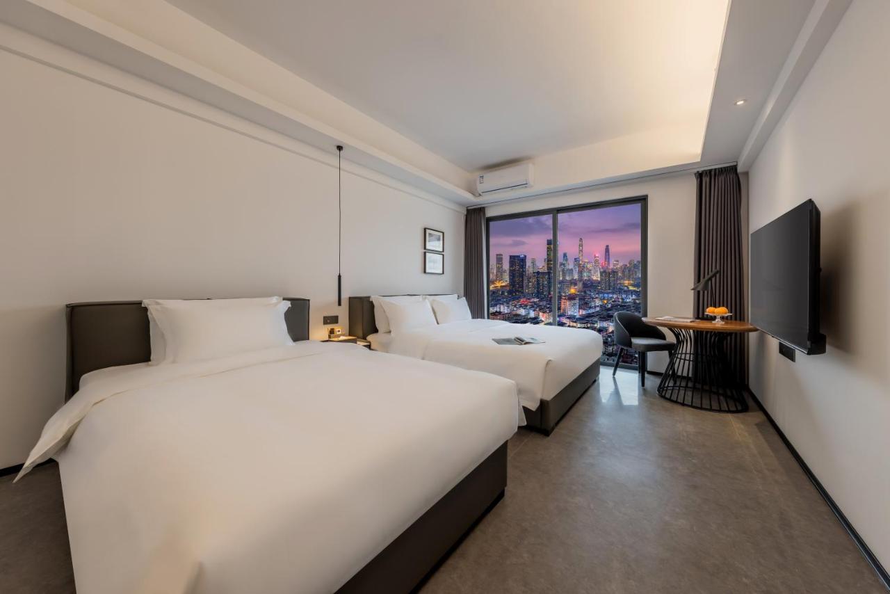 枫雨酒店公寓华强北店-Fengyu Hotel Apartment Shenzhen Huaqiang North Subway Station Branch - Chambres d’hôtes