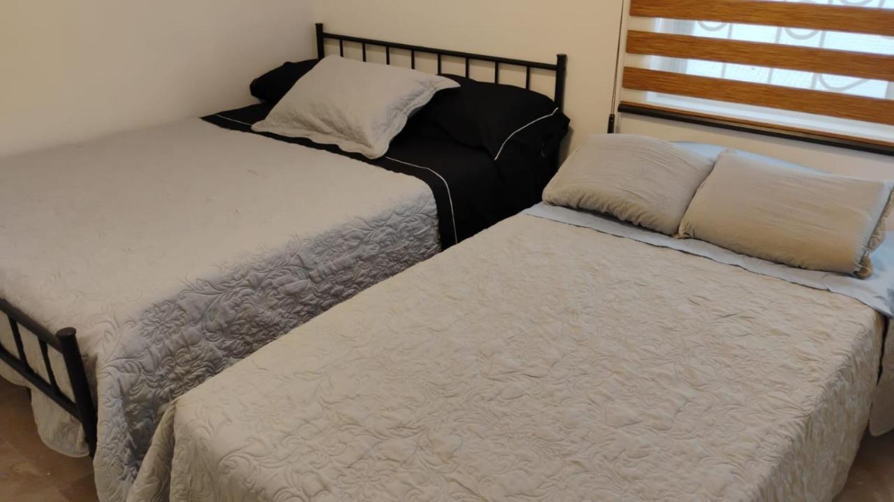 Basic Triple Room with Shared Bathroom