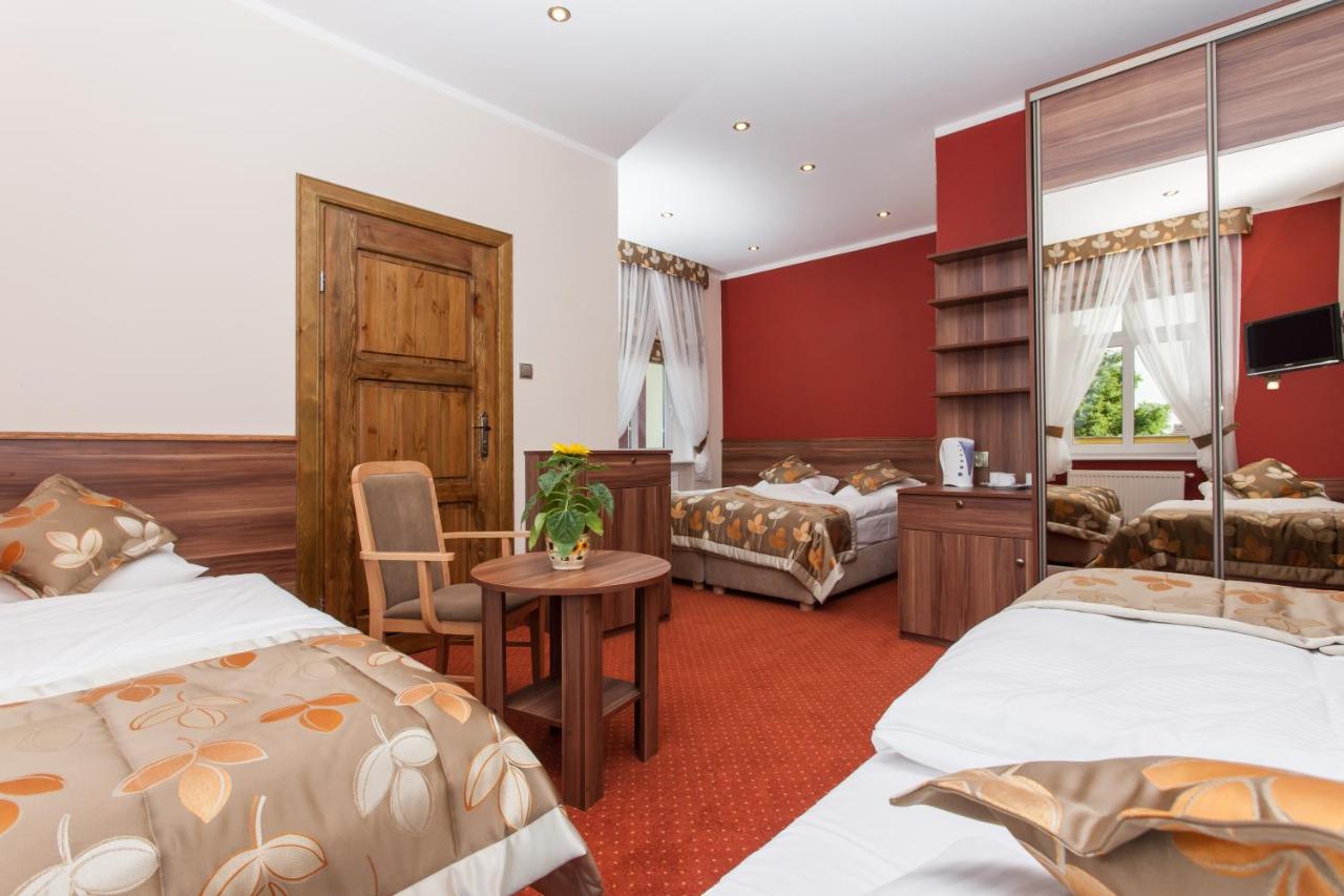 Quadruple Room (2 Adults + 2 Children)