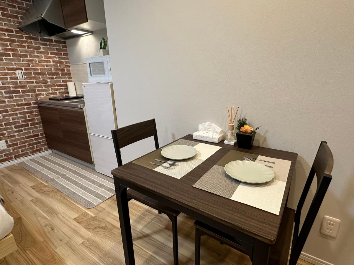 安楽居 - B&B Osaka