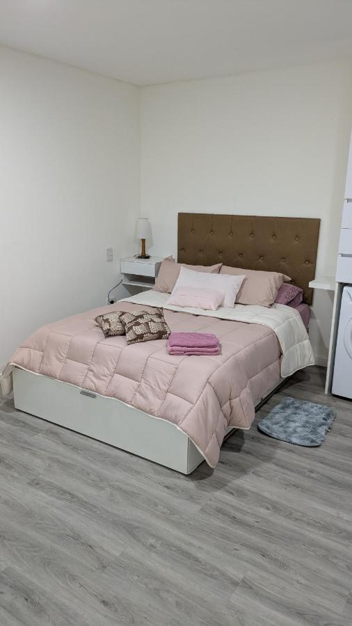 Monoambiente céntrico en planta baja con patio - Ferienwohnung Rosario