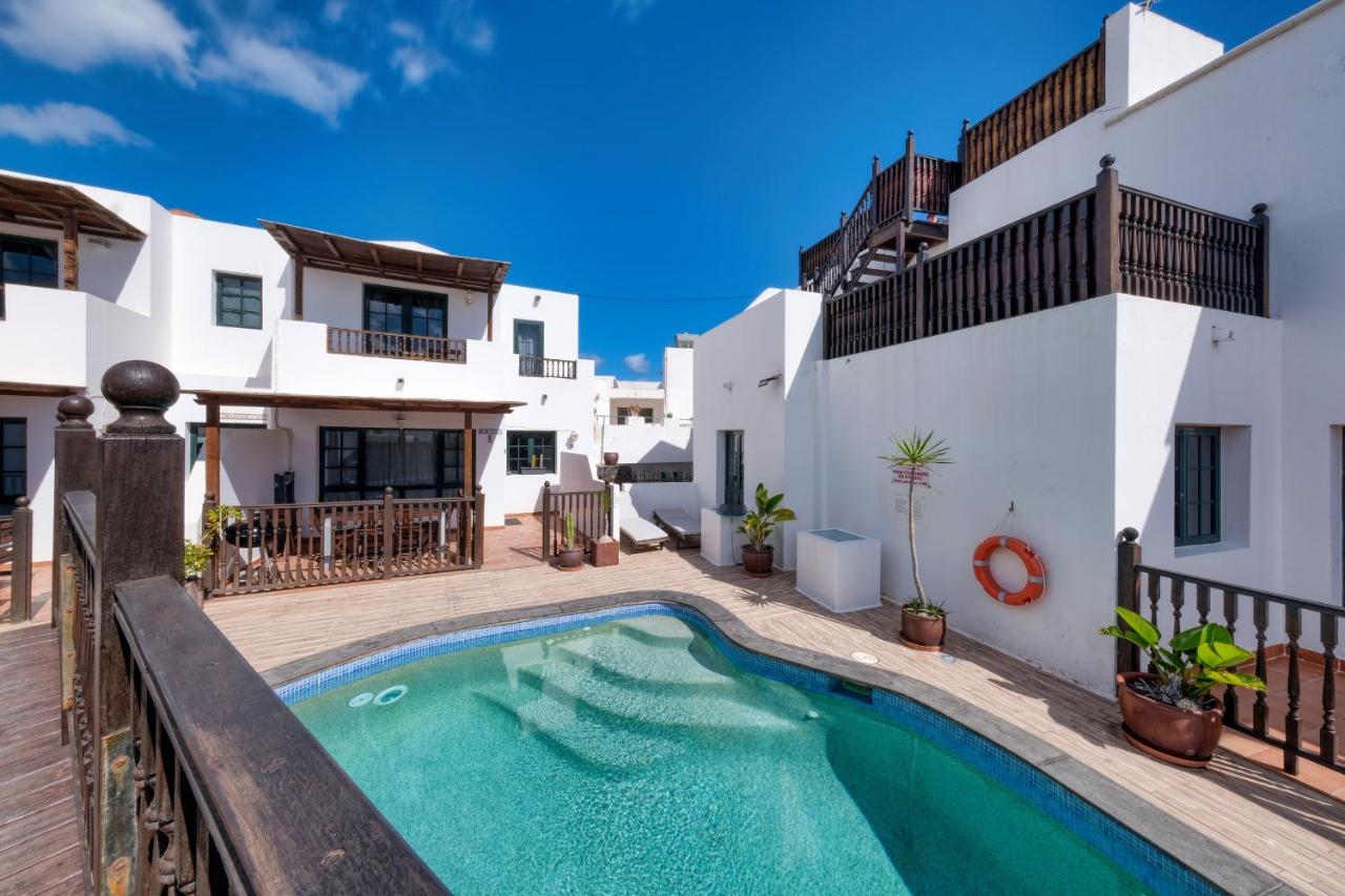 Casa Hibiscus - Shared Pool and BBQ - Close to Seafront Promenade By Lanzarote Vacation Homes - Ferienwohnung Punta Mujeres