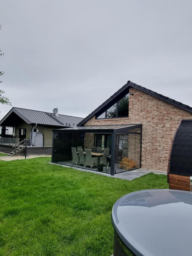 freistehendes Ferienhaus mit Sauna und Badefass - B&B Sehestedt