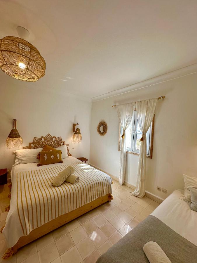Habitación Triple con vistas al jardín