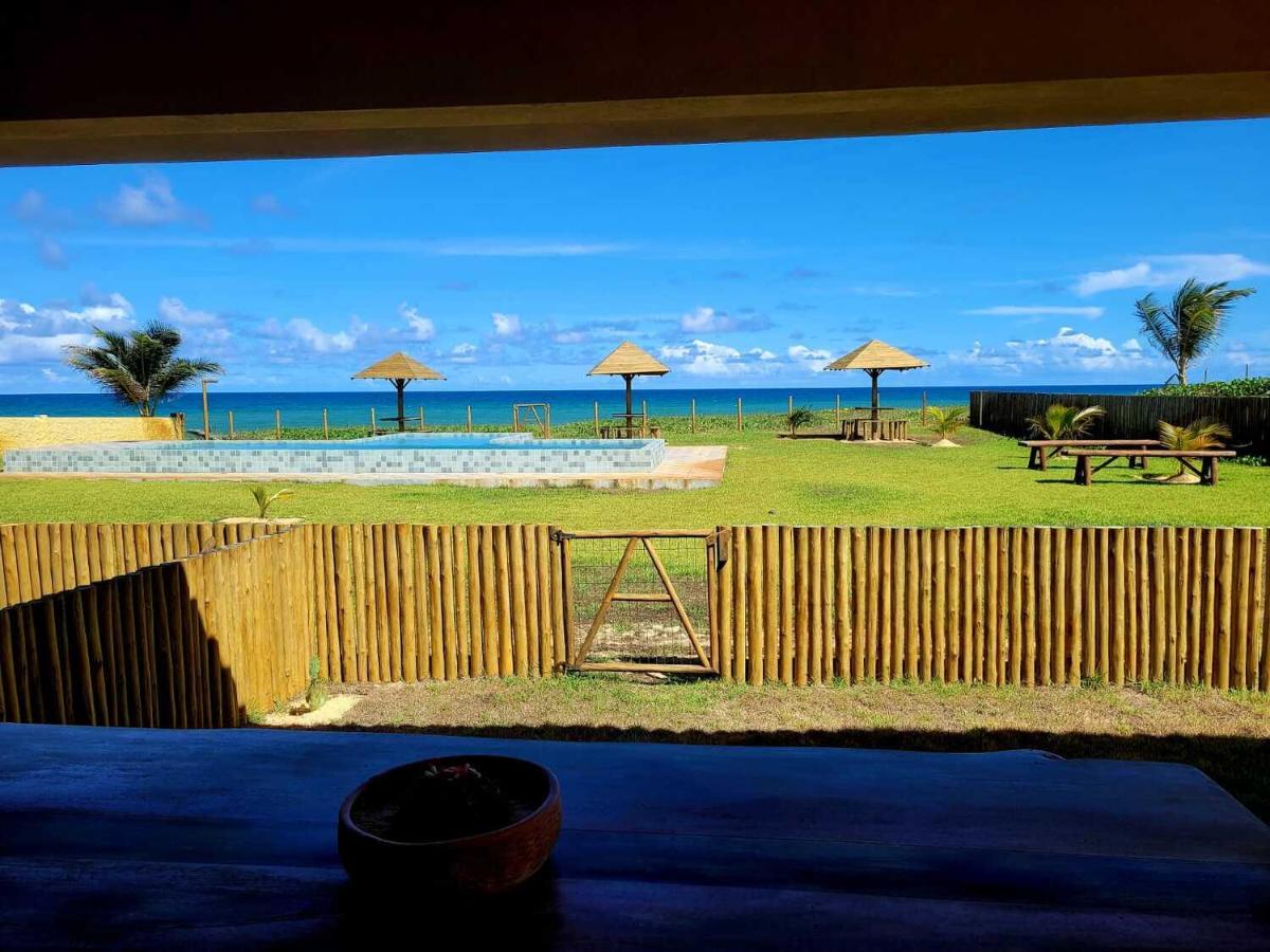 Casa de condomínio de frente a praia - Chambres d’hôtes