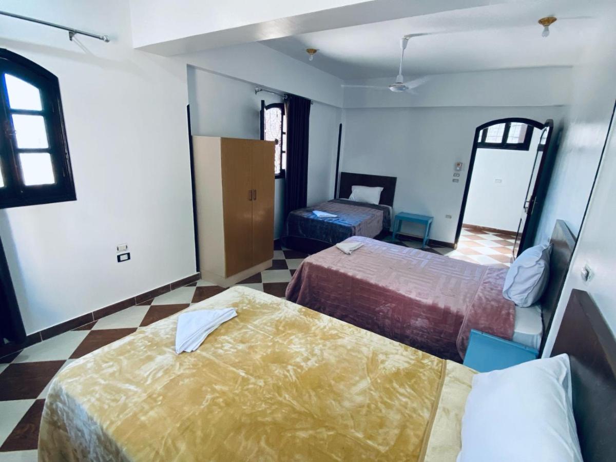 Camera Tripla con Bagno in Comune