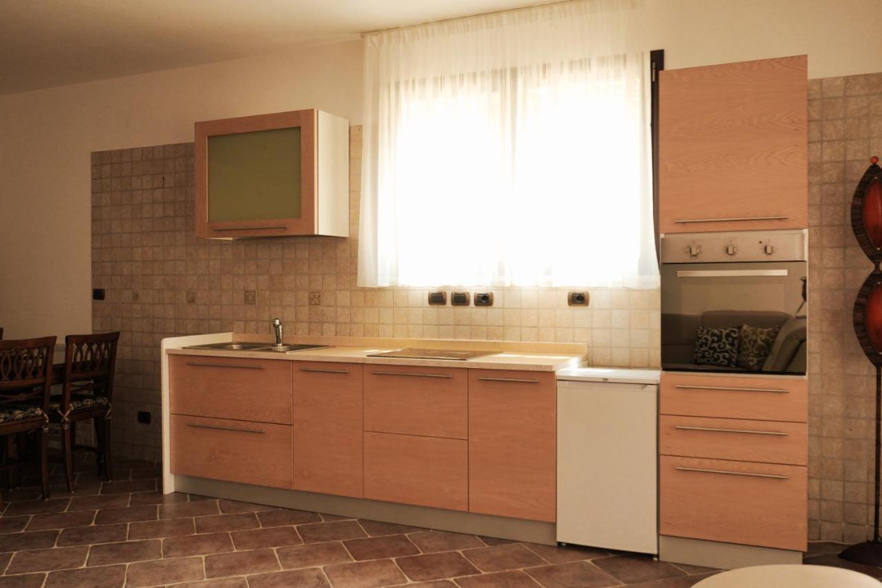 Piano terra in Villa con piscina - Ferienwohnung Poggio dei Pini