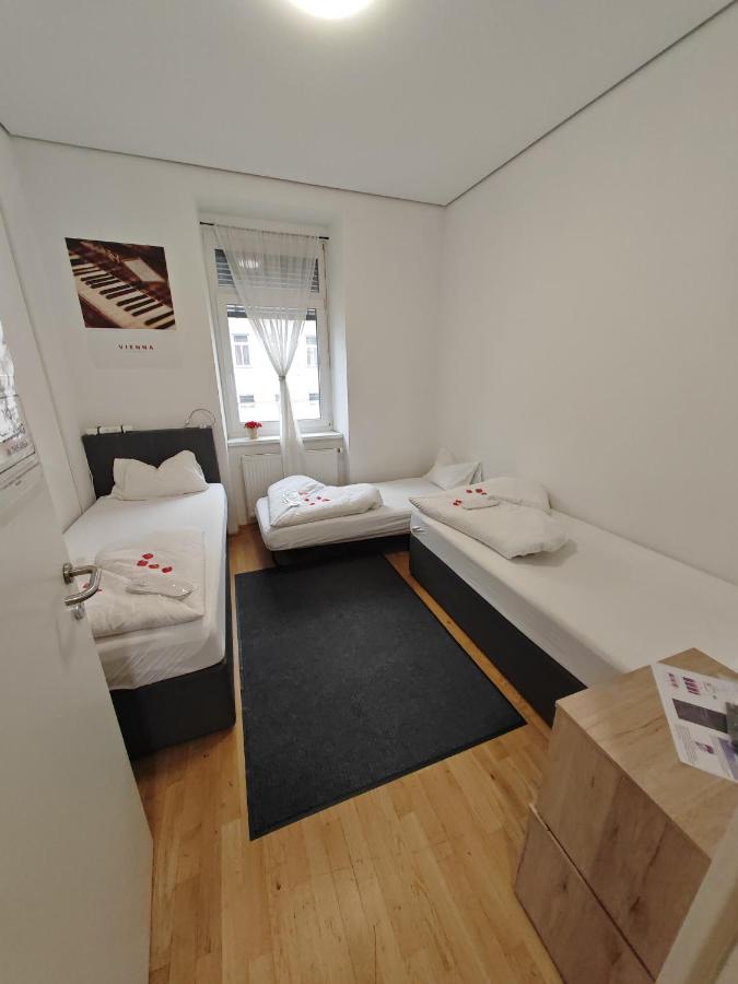 Camera Tripla con Bagno in Comune