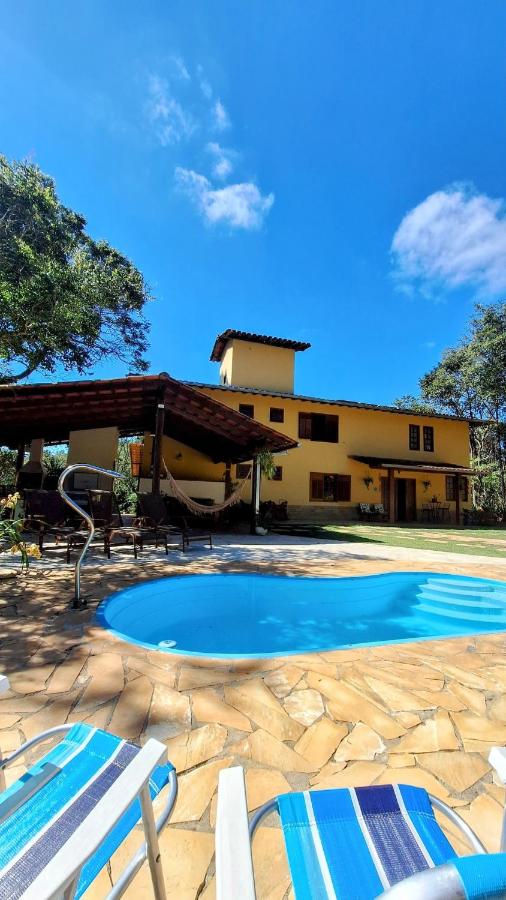 PISCINA AQUECIDA, 5 SUÍTES, trilha privativa até o riacho, Wi-fi, estacionamento, ampla área externa cercada de natureza exuberante - 200m do vilarejo - B&B Nova Lima