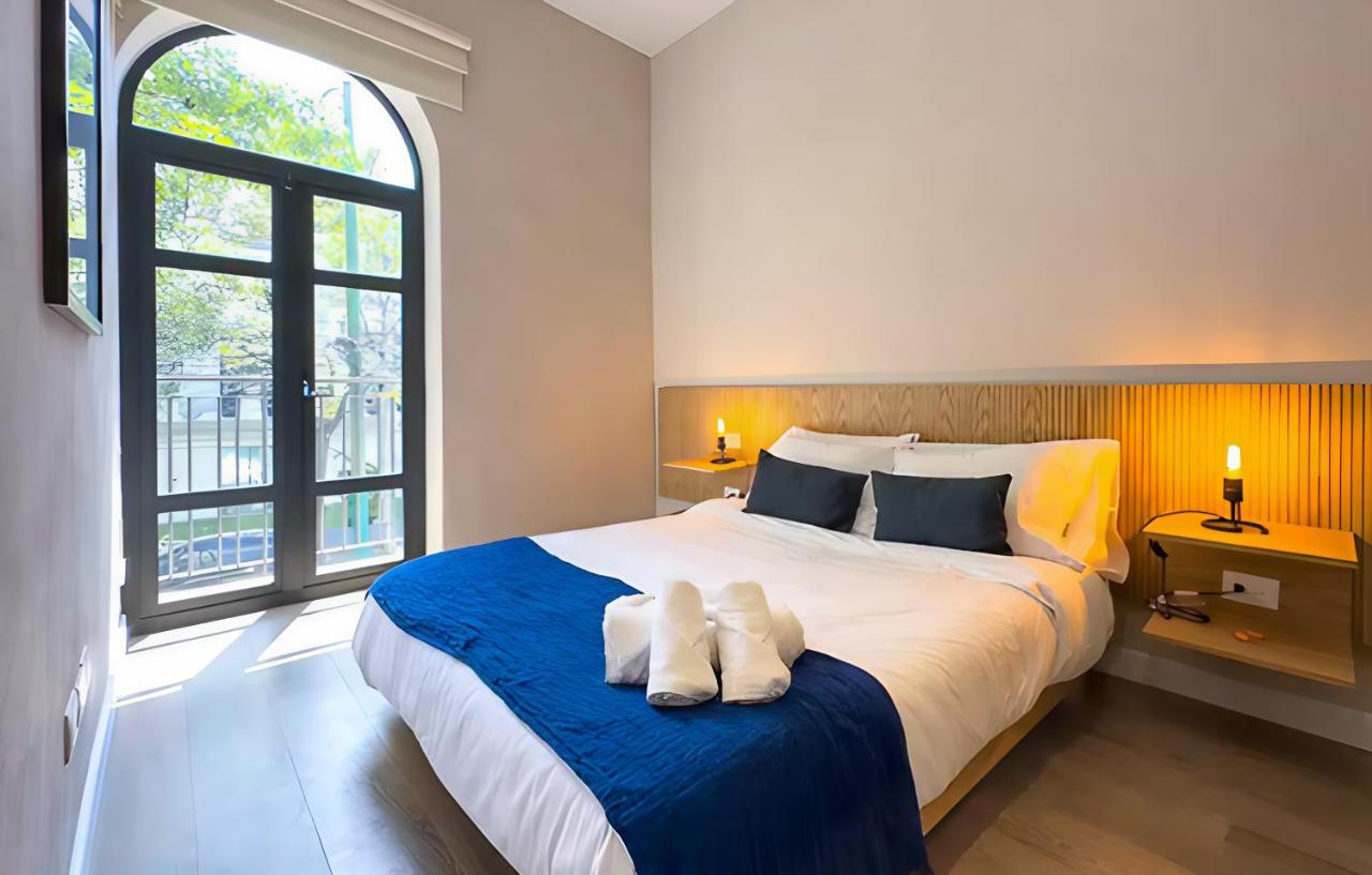 One-Bedroom Apartment with Balcony and City View