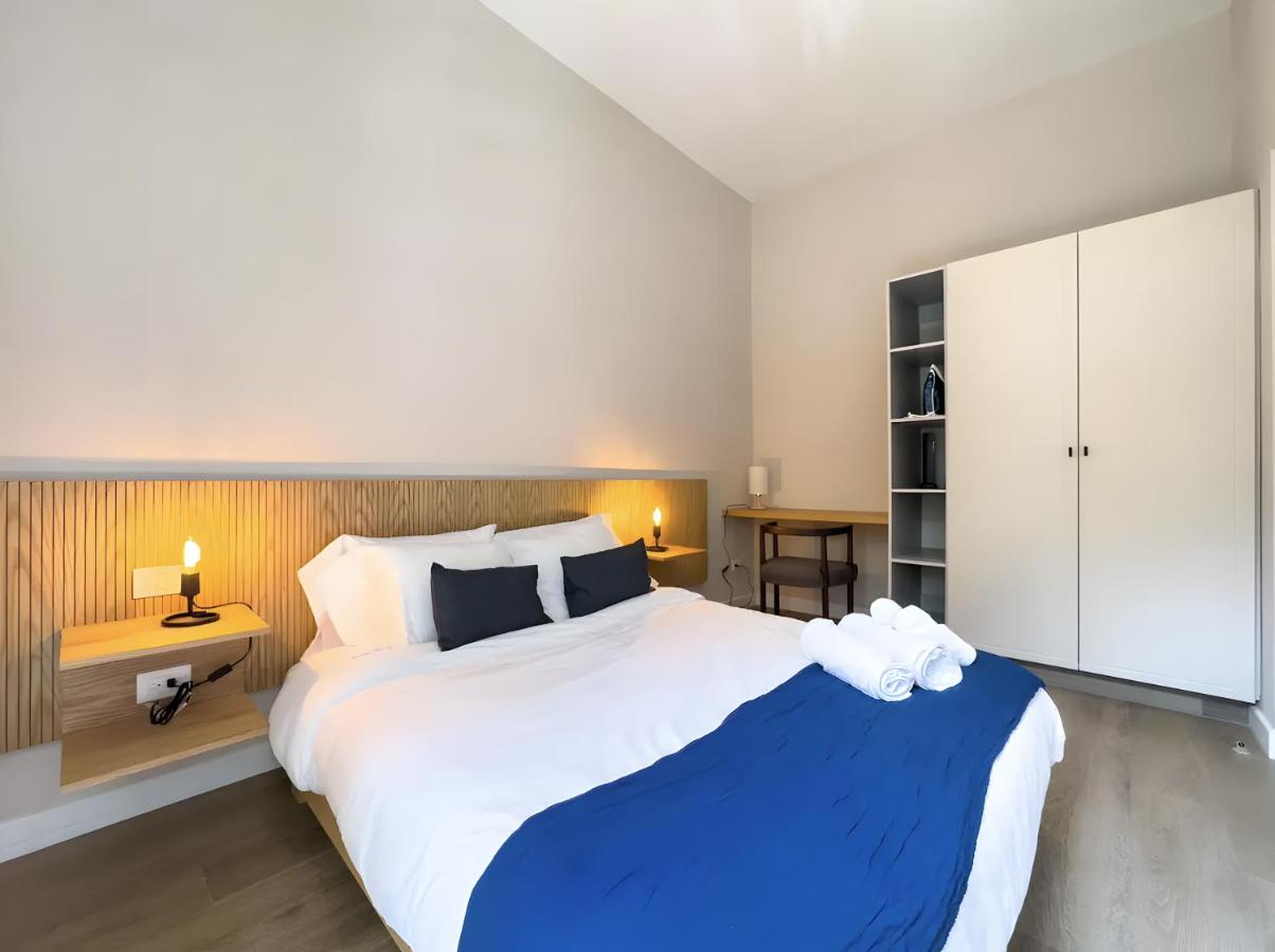 One-Bedroom Apartment with Balcony and City View