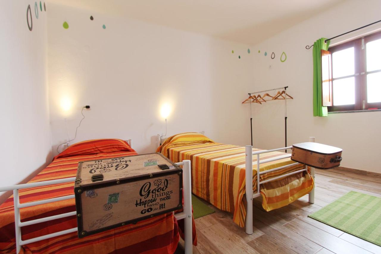 Economy Quadruple Room with Shared Bathroom