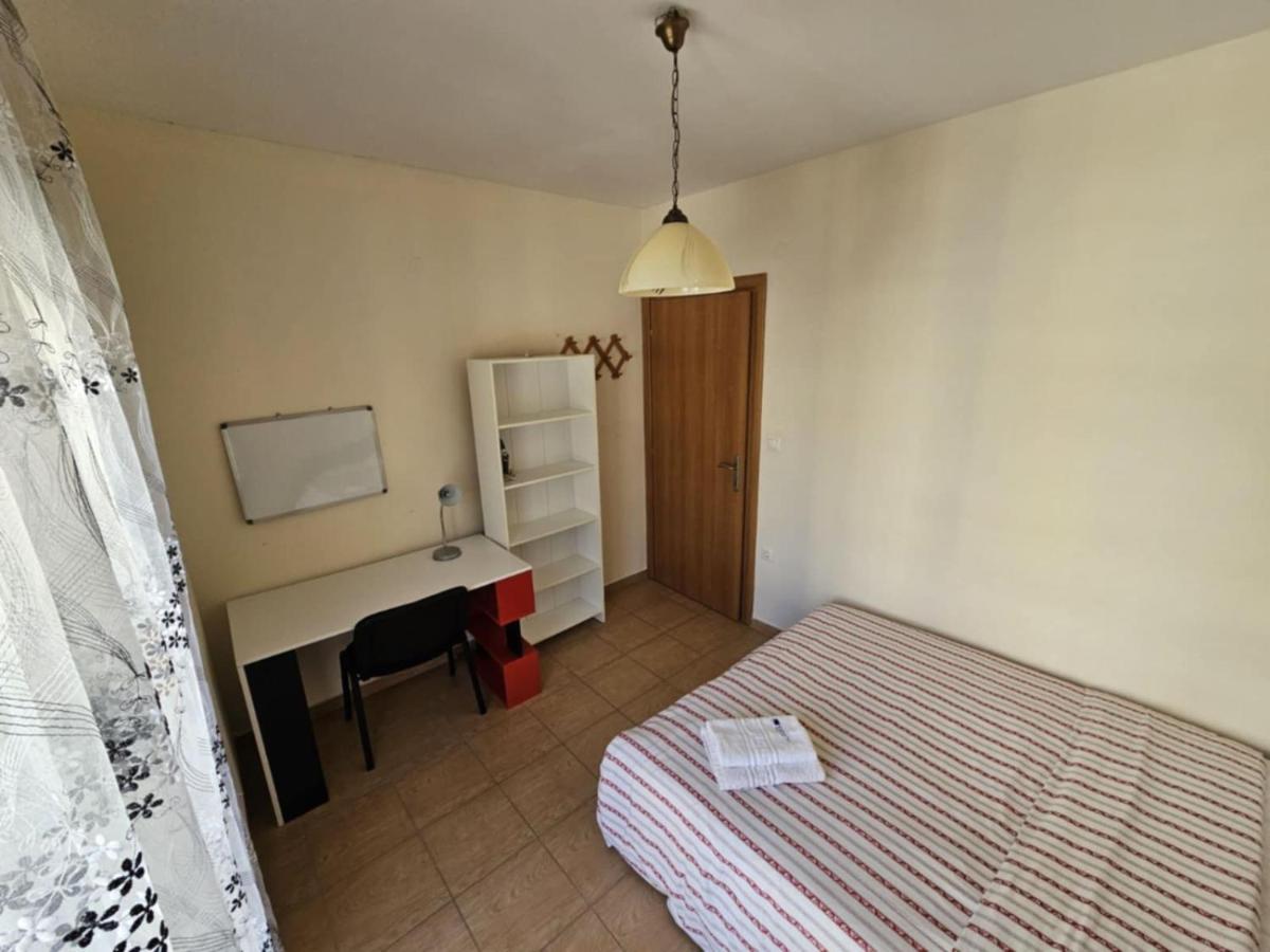 One-Bedroom Apartment with Balcony and City View
