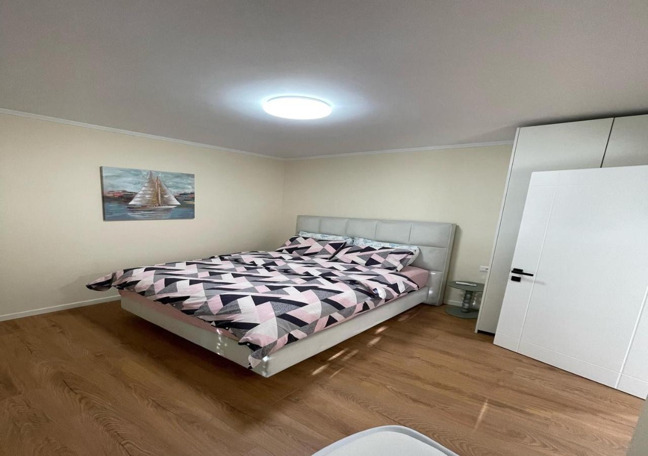 One-Bedroom Apartment with Balcony and City View