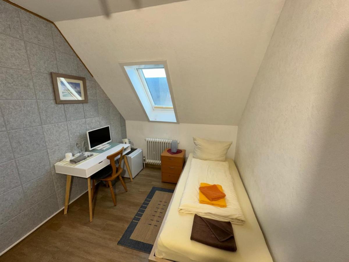 Habitación individual con aseo compartido