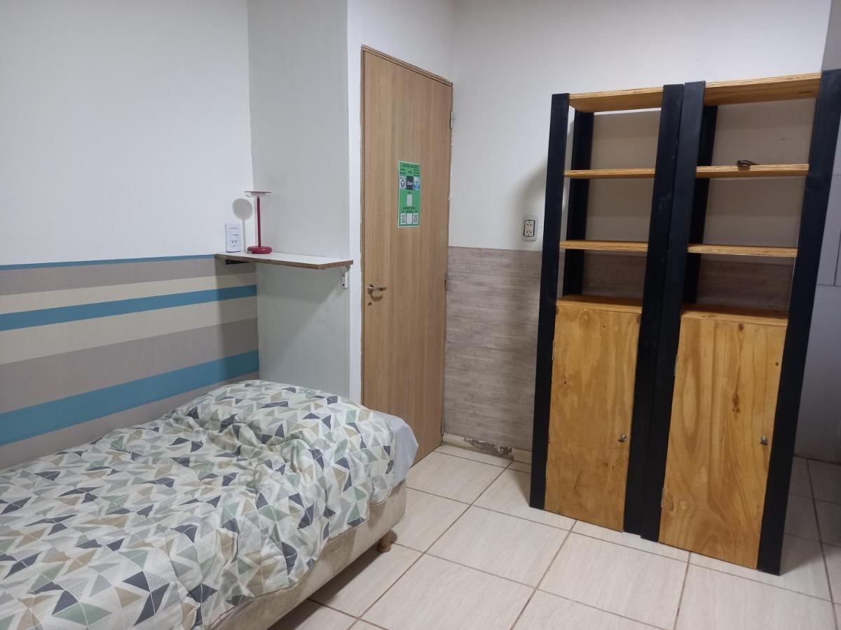 Single Bed in Dormitory Room