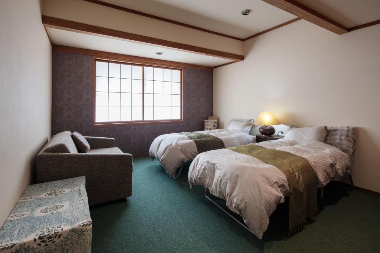 Chambre Quadruple - Vue sur Montagnes
