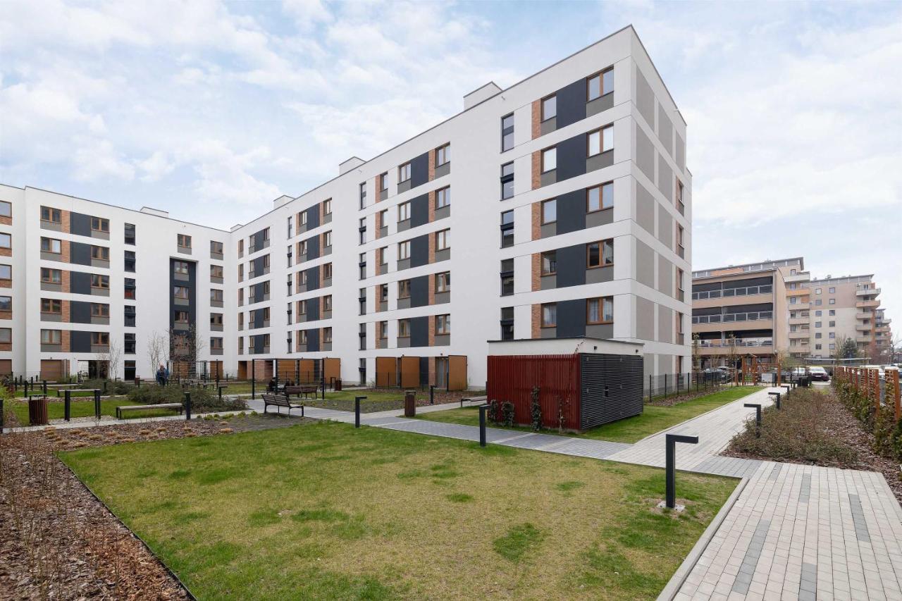 Nowoczesny Apartament w Krakowie z Klimatyzowanym Salonem Dwa Miejsca Postojowe by Noclegi Renters - Ferienwohnung