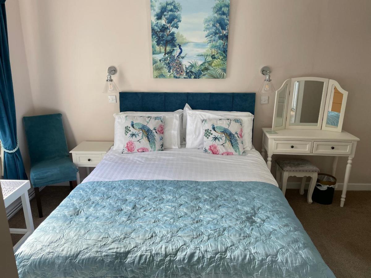 Kamer met Kingsize Bed en Uitzicht op de Tuin
